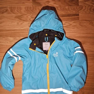 Jacka Regnskyddad BLWR - Jacka, fodrad regnjacka strl 122-128 