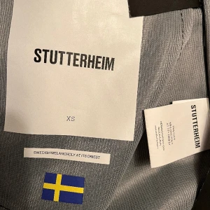 Intressekoll STUTTERHEIM XS W - Nyskick Svart.  Nypris 3800