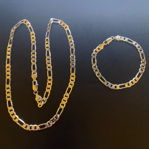 Ny tjock Silverpläterad (925)Halsband och Armband - Ny Halsband är 55 cm längd 6 mm bred. Ny Armband är 20 cm längd 6mm bred.