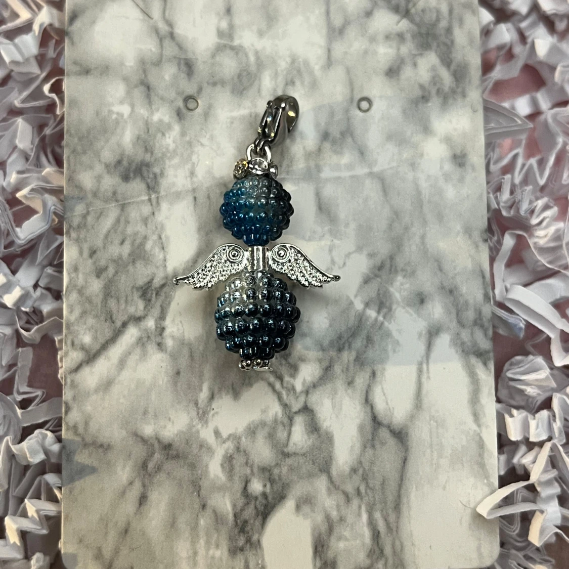 Svart och blå lyckoängel 