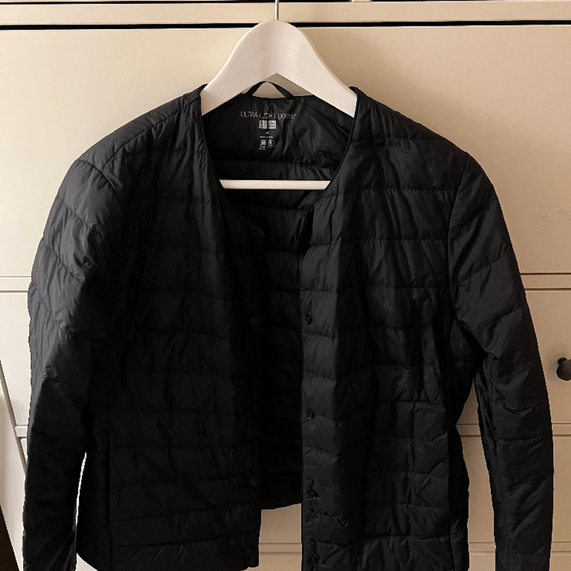 Svart dunjacka  - 90