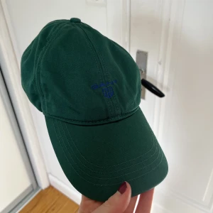 Gant keps  - Mörkgrön keps från Gant! One size 