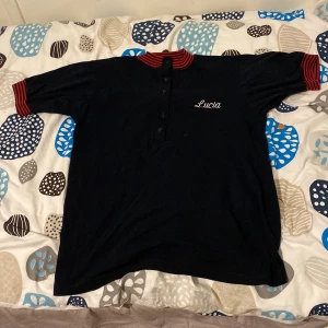 quarter button t shirt (lucia) - selling this bc i dont rlly like it but its really comfortable it has 5 buttons