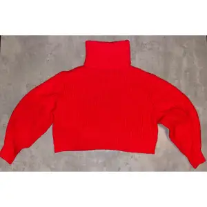 Röd stickad tröja från H&M, stl.XS/S. Bara använd 1 gång. Inga som helst tecken på användning.