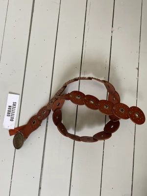 Urban outfitters skärp  - Urban Outfitters skinn skärp, original pris 600kr. Oanvänd, ny skick