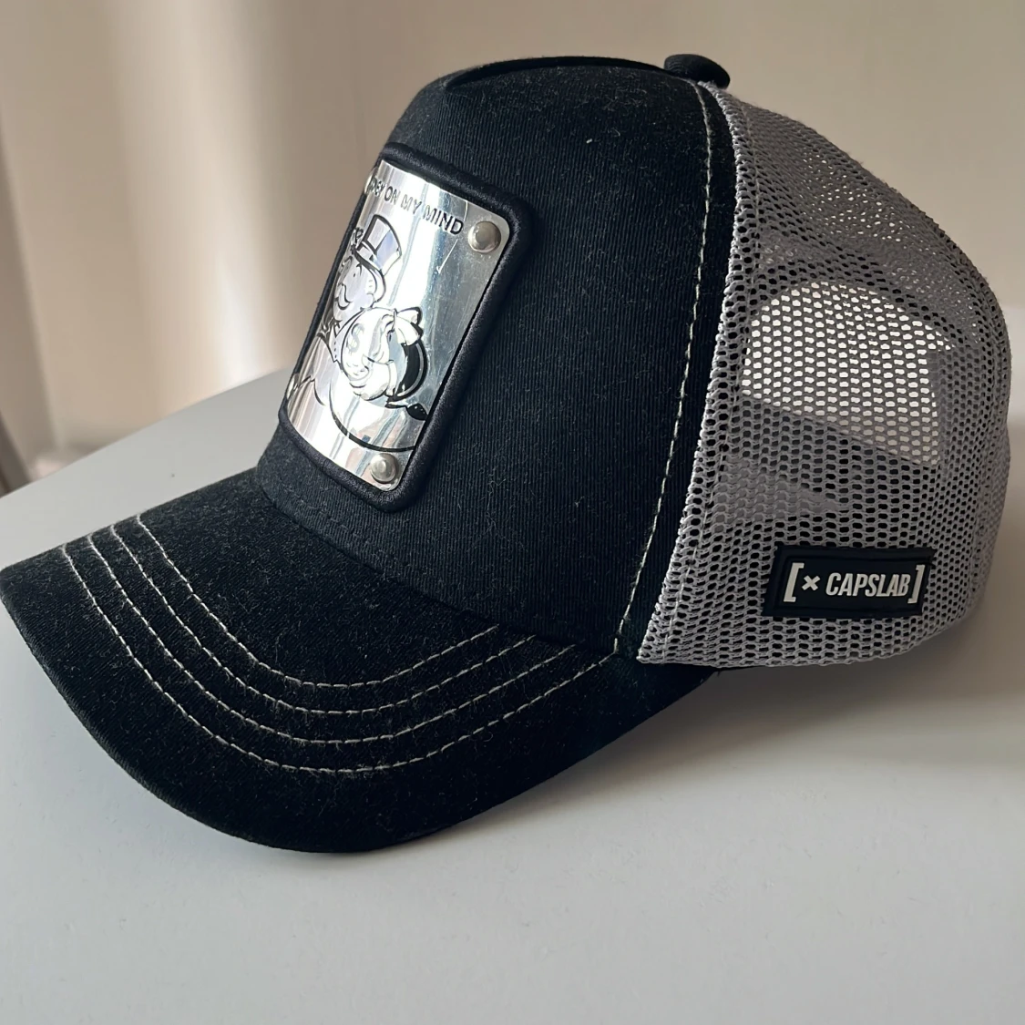 Monopolkeps Capslab - 91