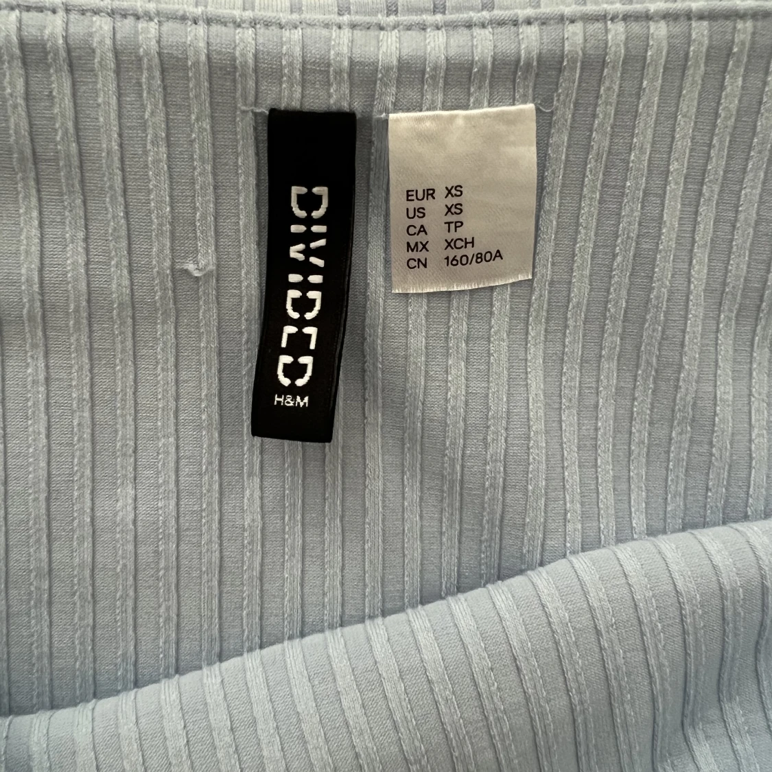 Ljus blå tröja - 91