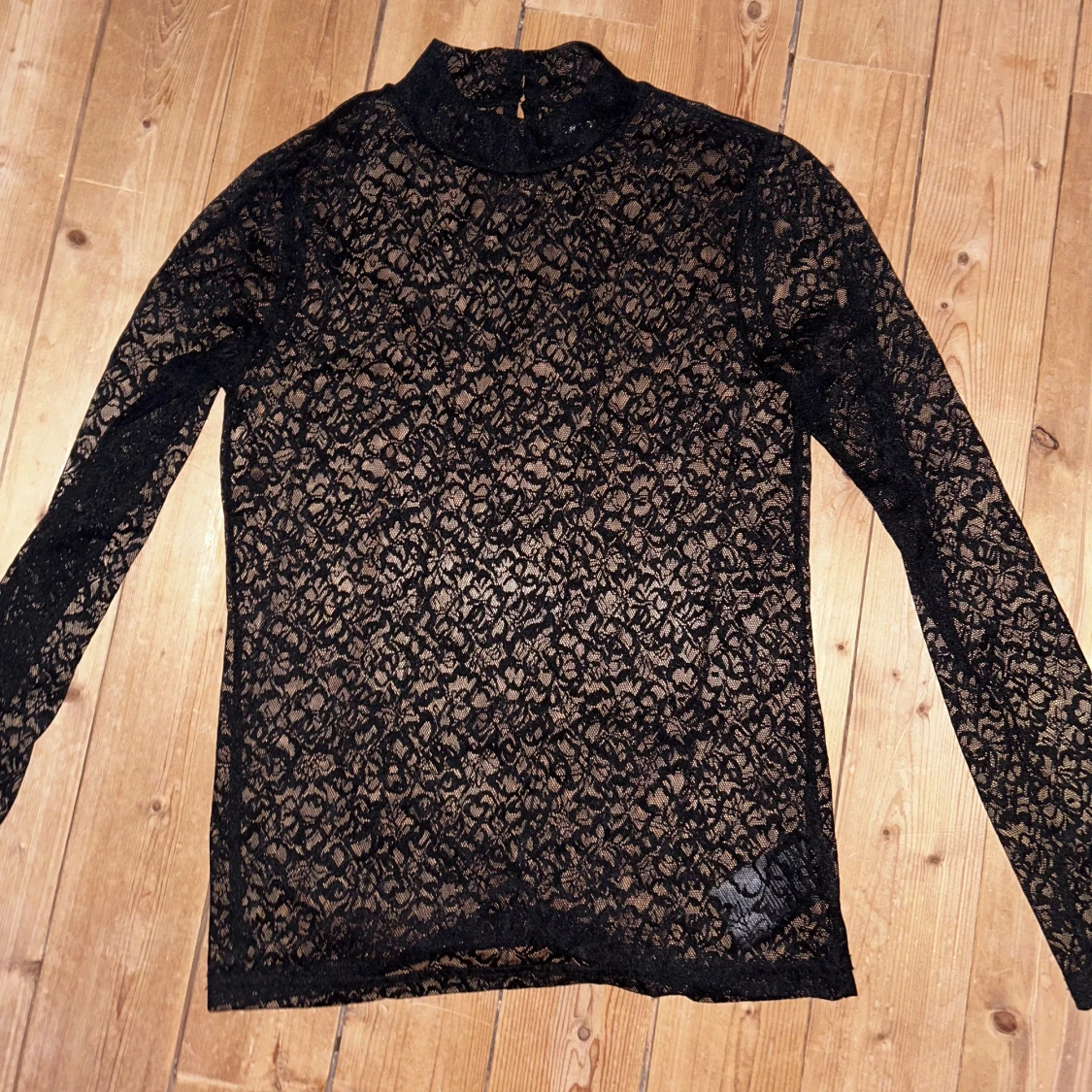 Genomskinlig spetstopp 