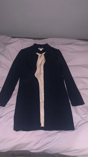 Fin kappa - Väldigt fin kappa som är använd 2 gånger. Storlek 34