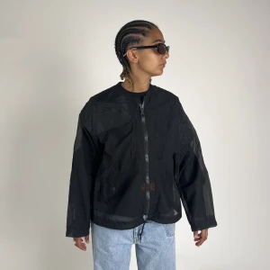 Tunn jacka - Cool, tunn jacka från okänt märke. 