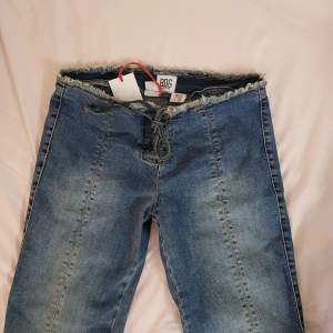 Urban Outfitters BDG low rise flare raw hem jeans. Y2k style. Brand new never worn, do not fit me