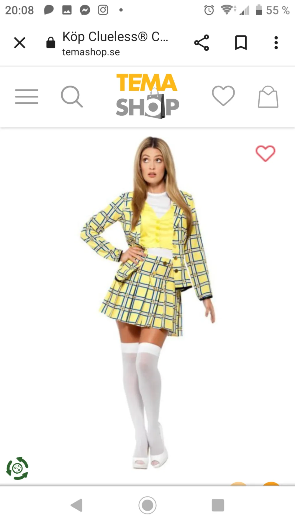 Klänning som ser ut som en kjol med gul top o matchande kavaj precis som Cher från filmen Clueless . Klänningar.