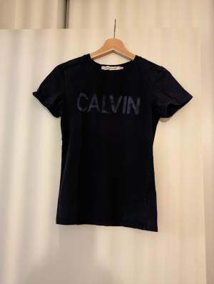 Black basic T-Shirt. Easy to combine with anything. Used occasionally.