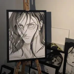 Drawing of the Attack On Titan character Eren on thick paper with the size 50cm x 40cm put in black Ikea frame