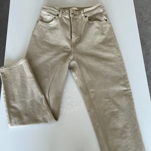 Beige high wasted jeans  - Bra material. 