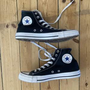 Svarta Converse 