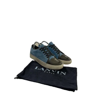 Lanvin cap Toe sneakers  - Lanvin cap Toe sneakers  Storlek: 40 passar 41 Cond: 9/10 Pris: 2350:-  Dustbag tillkommer   Skriv pm för mer information 