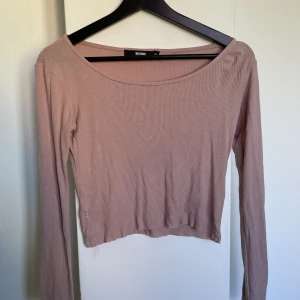 Ljusrosa långärmad - Använd men i gott skick. 