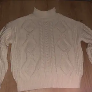 White knitted sweater. Never used. Size XS. About a year old. Perfect for winter. 