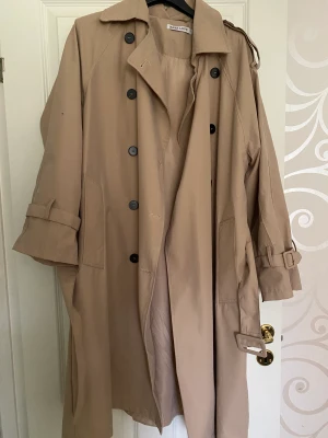 Trenchcoat - Ny Stor i storleken