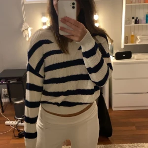 Randig tröja - Randig stickad tröja, storlek S.