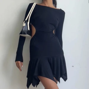 Klänning från Motel Rocks - Superfint festklänning från Motel Rocks. Aldrig använt 