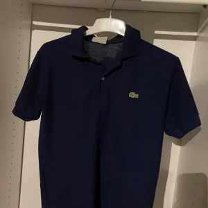 Lacoste piké - Som ny knappt använd kan gå ner i pris om det behövs 