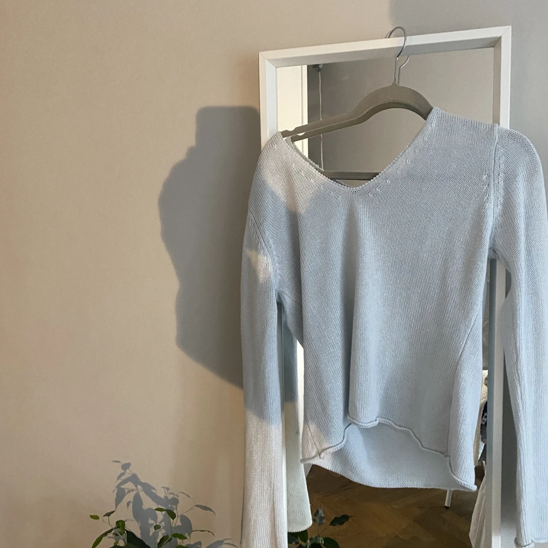 Ljusblå stickad tröja