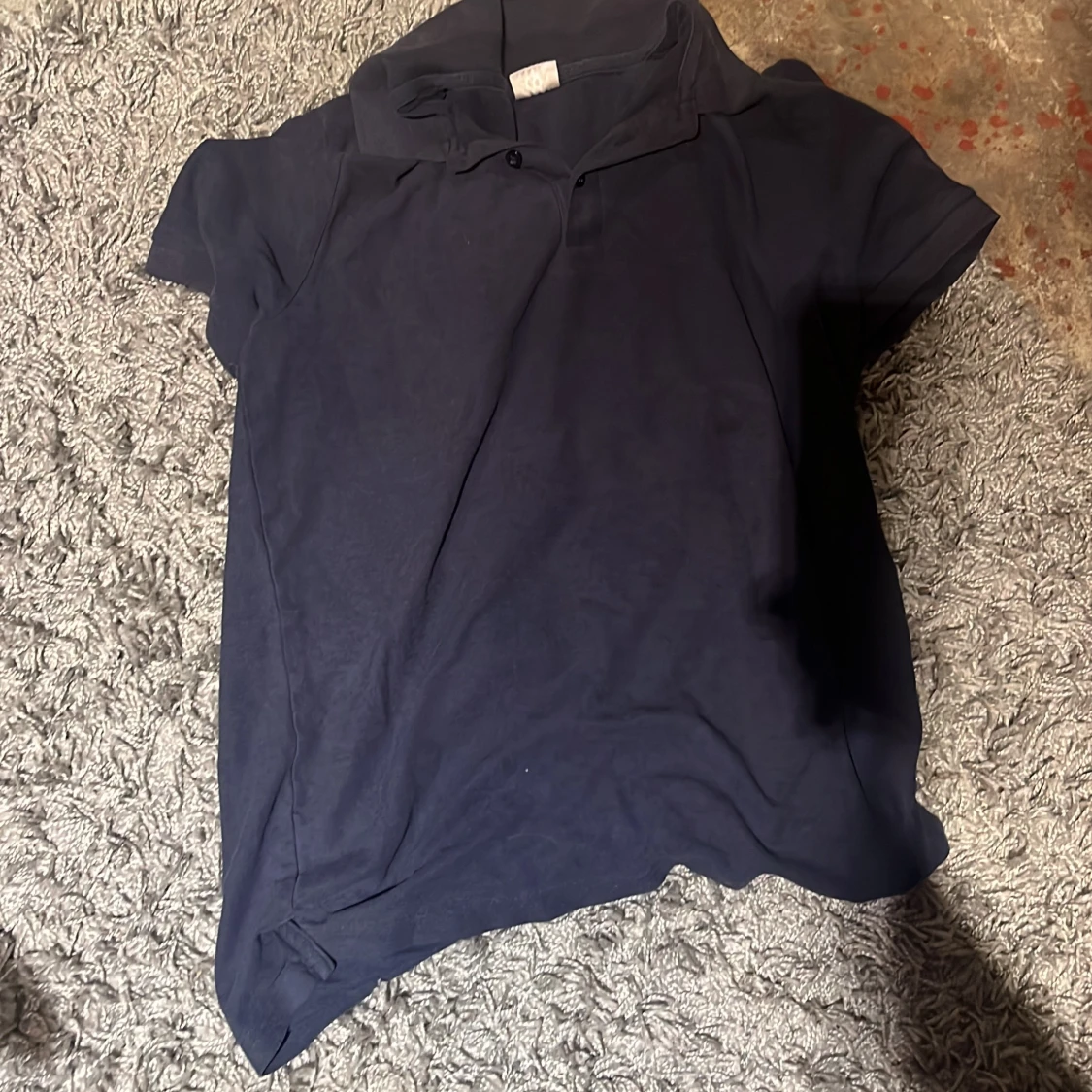 Blå tröja och den är ifrån Line One