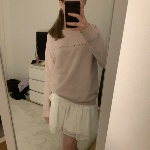 Sweatshirt  - En ljusrosa sweatshirt 