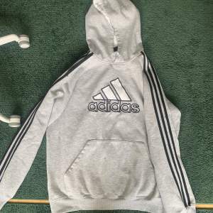 Adidas hoodie, has a small hole on the pocket and some paint stains (picture 2)