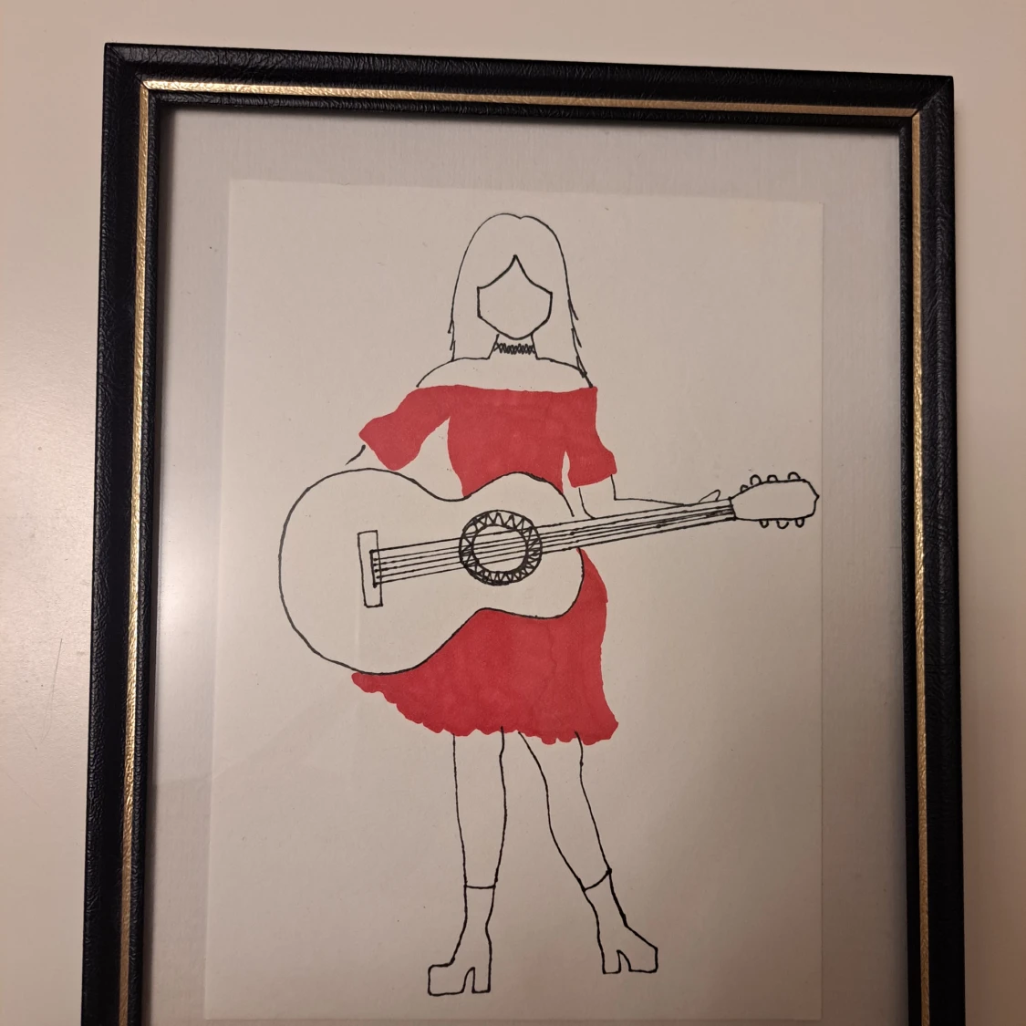 Teckning, gittarspelande tjej