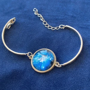 Armband kosmos  - Ett vackert armband med universum inglasat