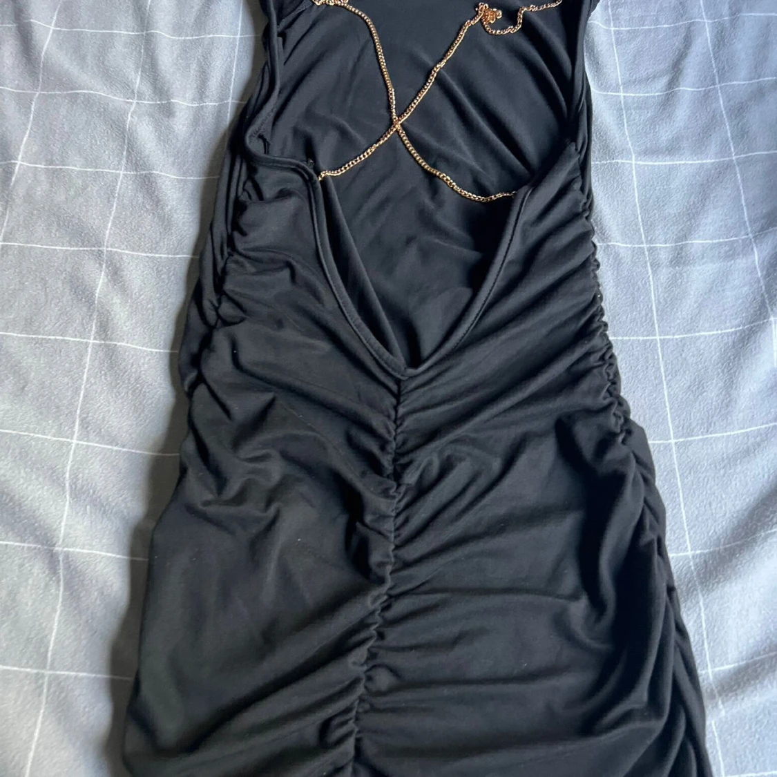 Backless black dress