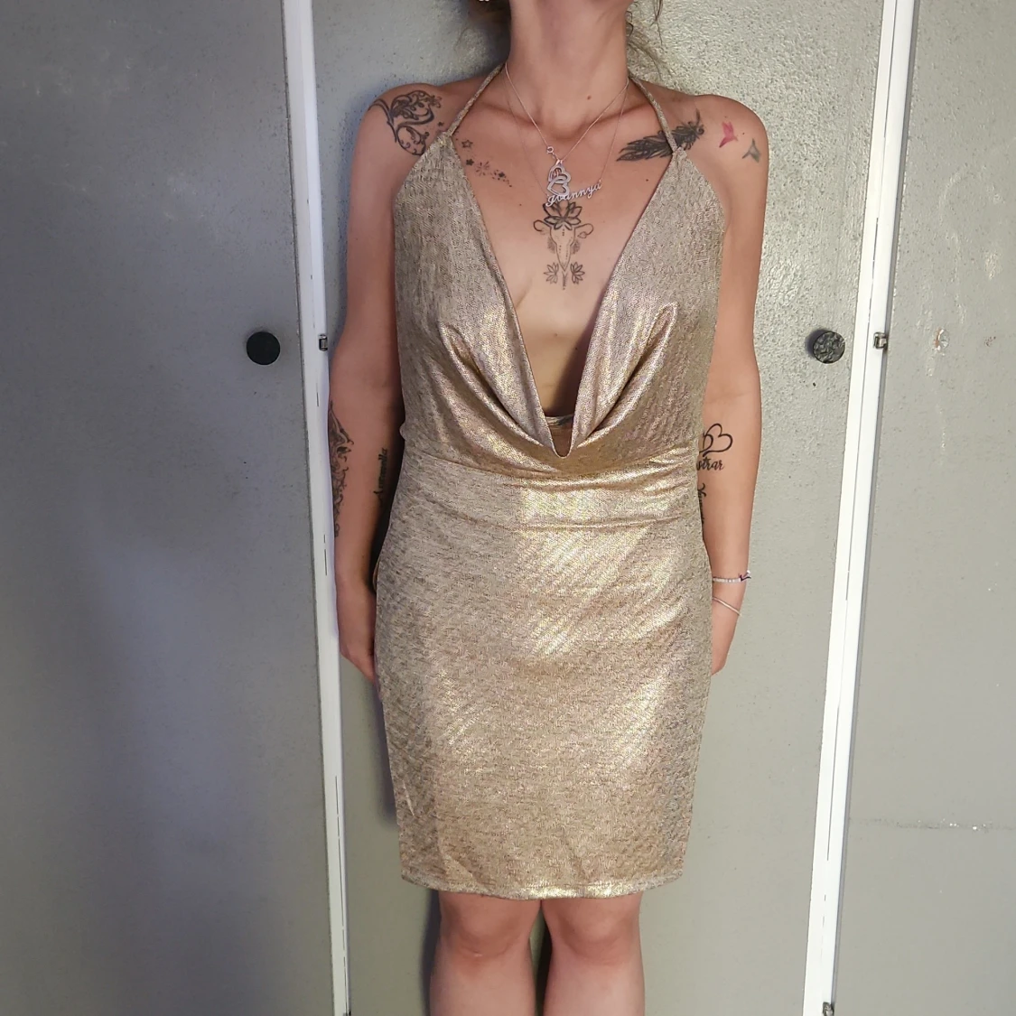 Open slit gold dress
