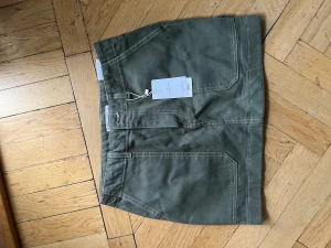 Green mini skirt MANGO - Perfectly new, with tags!  Never worn  