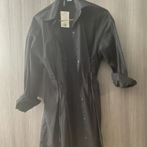 Klänning H&M - Fin skjortklänning. Aldrig använd