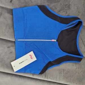 Sportbra  - Oanvänd sportbra från Röhnisch. Storlek S 