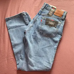 Never before worn Original 501 Levi’s Jeans! They still have the original tag and are in brand new condition. The jeans are high rise and straight leg.   Price can be discussed! 