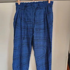 Blue suit trousers from desigual  - Stunning blue trousers with "feel your energy" embroidery and graphic print, from desigual. Worn a handfull of times. I also have the matching suit jacket on my listings.