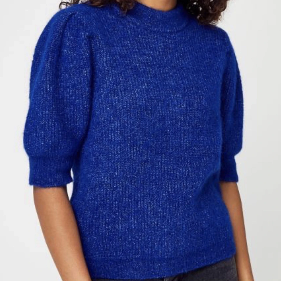 Stickad trekvartströja