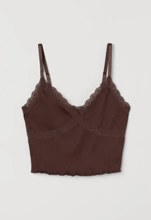 Ribbad top - Topp från h&m med justerbara band. Använd ett par gånger och är i bra skick. Skriv gärna för fler bilder! (: