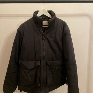 Our legacy jacket - Warm Our Legacy black bomber jacket. Size M (48). Well used but in good condition. Has a tiny scratch from the zipper but doesn't show when upzipped:  Measurements: Length: 73 cm Shoulder width: 48 cm Sleeve length: 65 cm