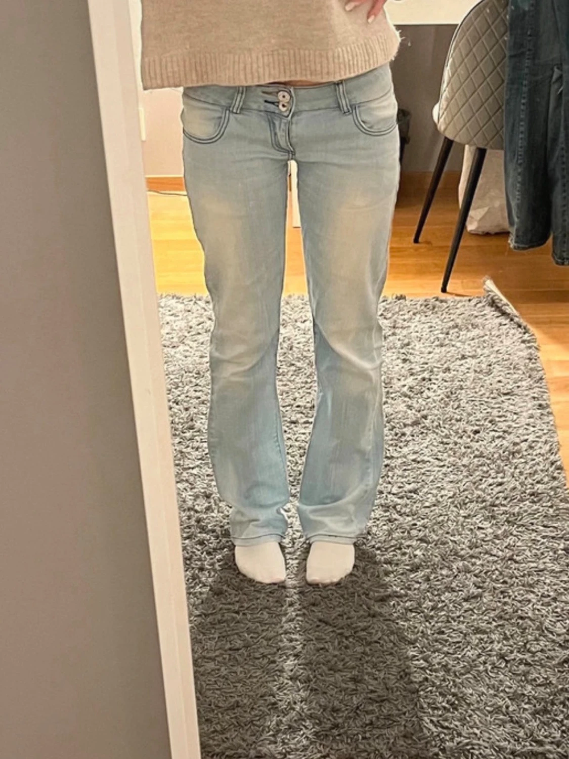 Ljusblå lågmidjade bootcut jeans