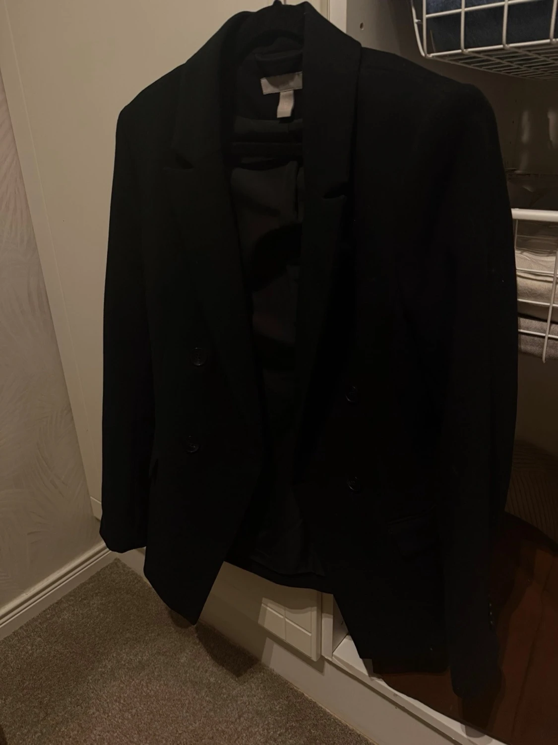 Svart kavaj med dubbelknäppning