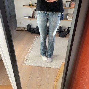 Ljusblå bootcut jeans  - Ljusblå Replay jeans