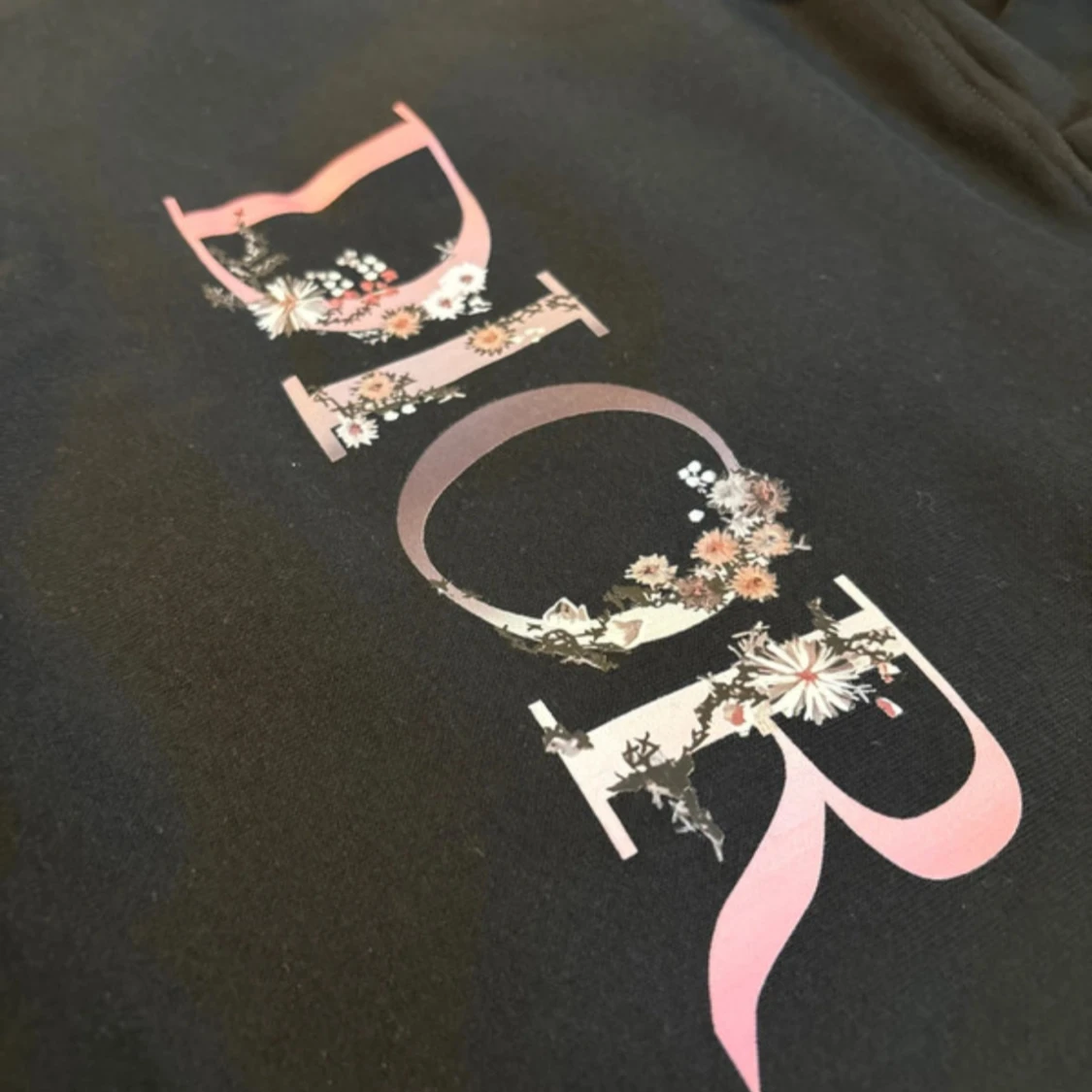 Svart Dior hoodie med blommigt tryck