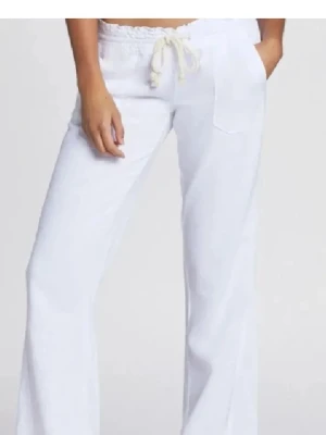 Linnebyxor - Använd en sommar, en liten grön fläck baktill, men inget man tänker på. 