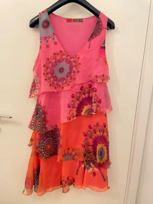 Rosa/orange klänning  - Priset går att diskutera. 