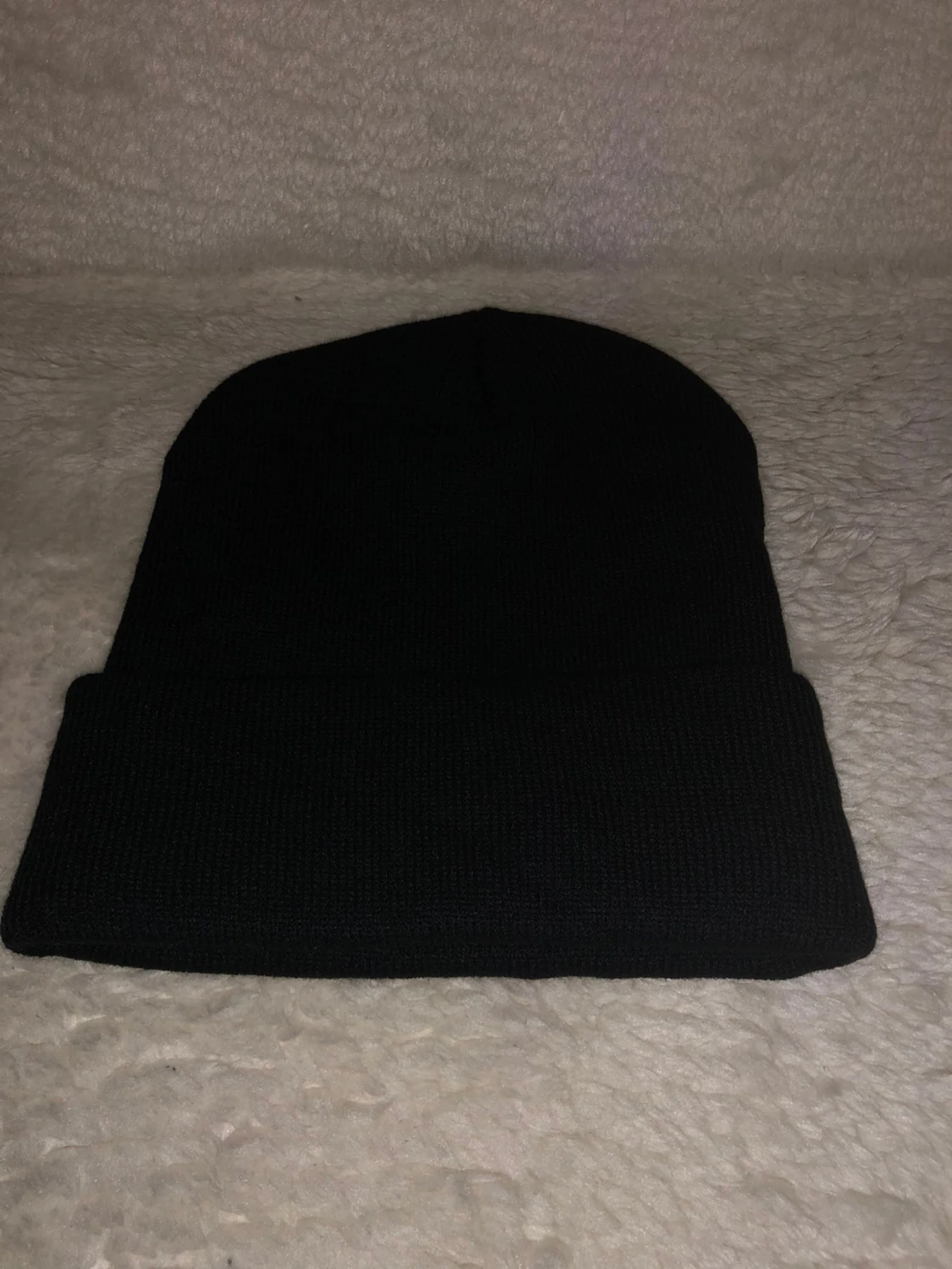 Svart stickad mössa från Lacoste